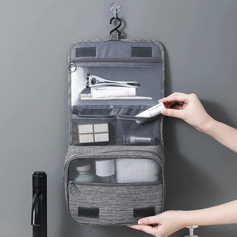 Hanging toiletry bag packed as part of a UK university bathroom checklist