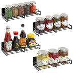 Four black magnetic spice racks for fridge storage