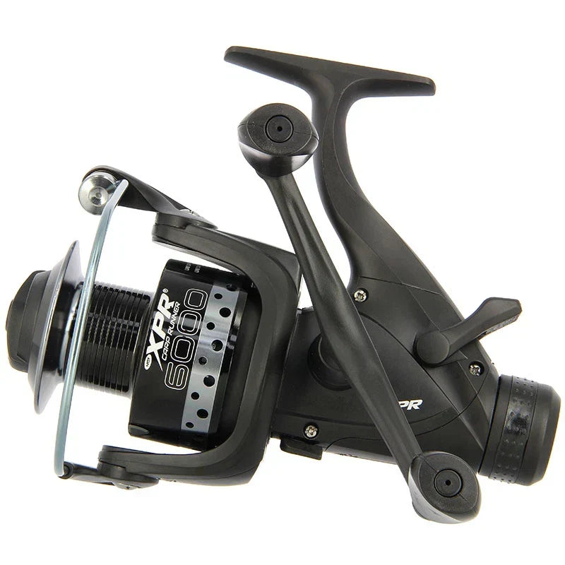 2x NGT XPR 6000 Carp Fishing Bait Runner Reels Twin Handle 10BB + Spare Spools — on a clean white background